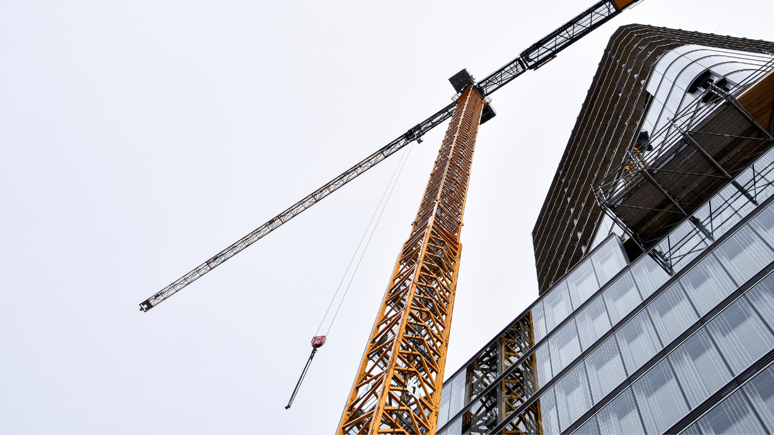 Industrial crane and skyscraper, what is skyscraper content