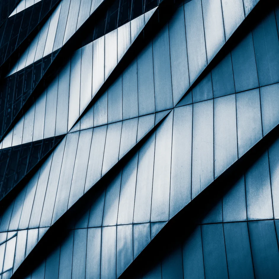 A building featuring a striking blue and white patterned exterior.