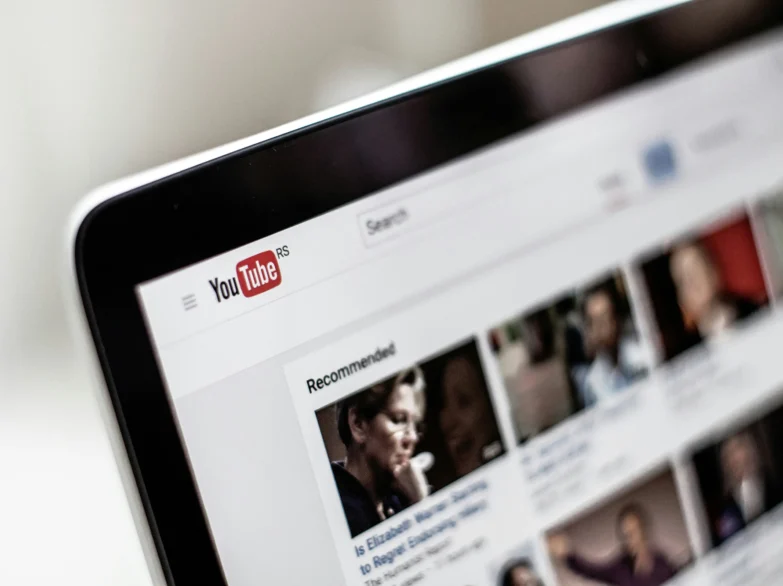 Close up of a YouTube page displayed on a laptop.