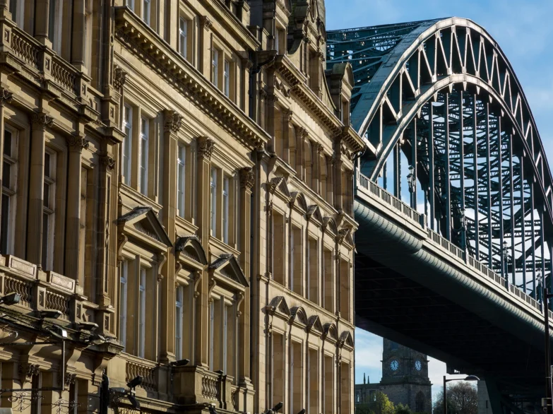 Juxtaposition of Edwardian architecture and the Tyne Bridge, Newcastle upon Tyne.